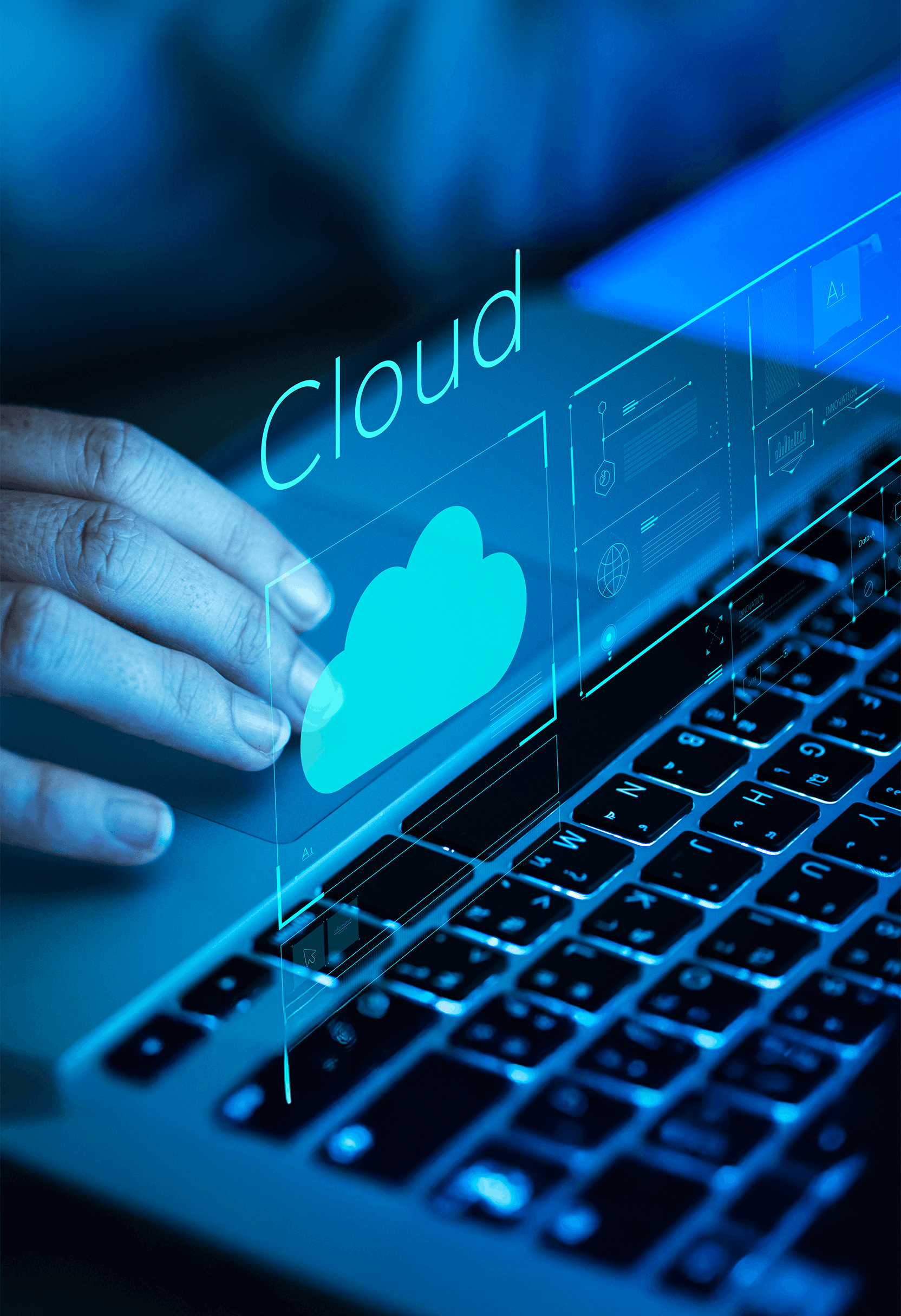 Hands typing on a laptop with cloud computing visuals, symbolizing secure cloud platforms and scalable infrastructure.