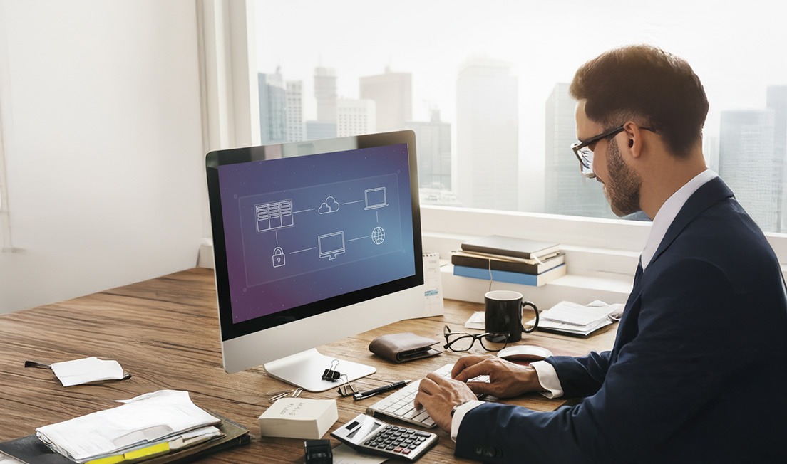 Professional managing controlled system changes with governance and compliance checks